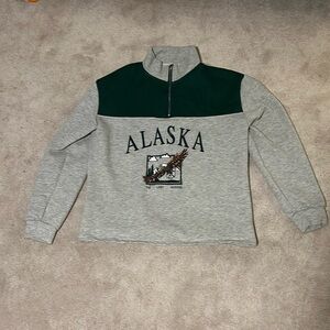 size small grey and green women’s Alaska graphic quarter zip from Amazon